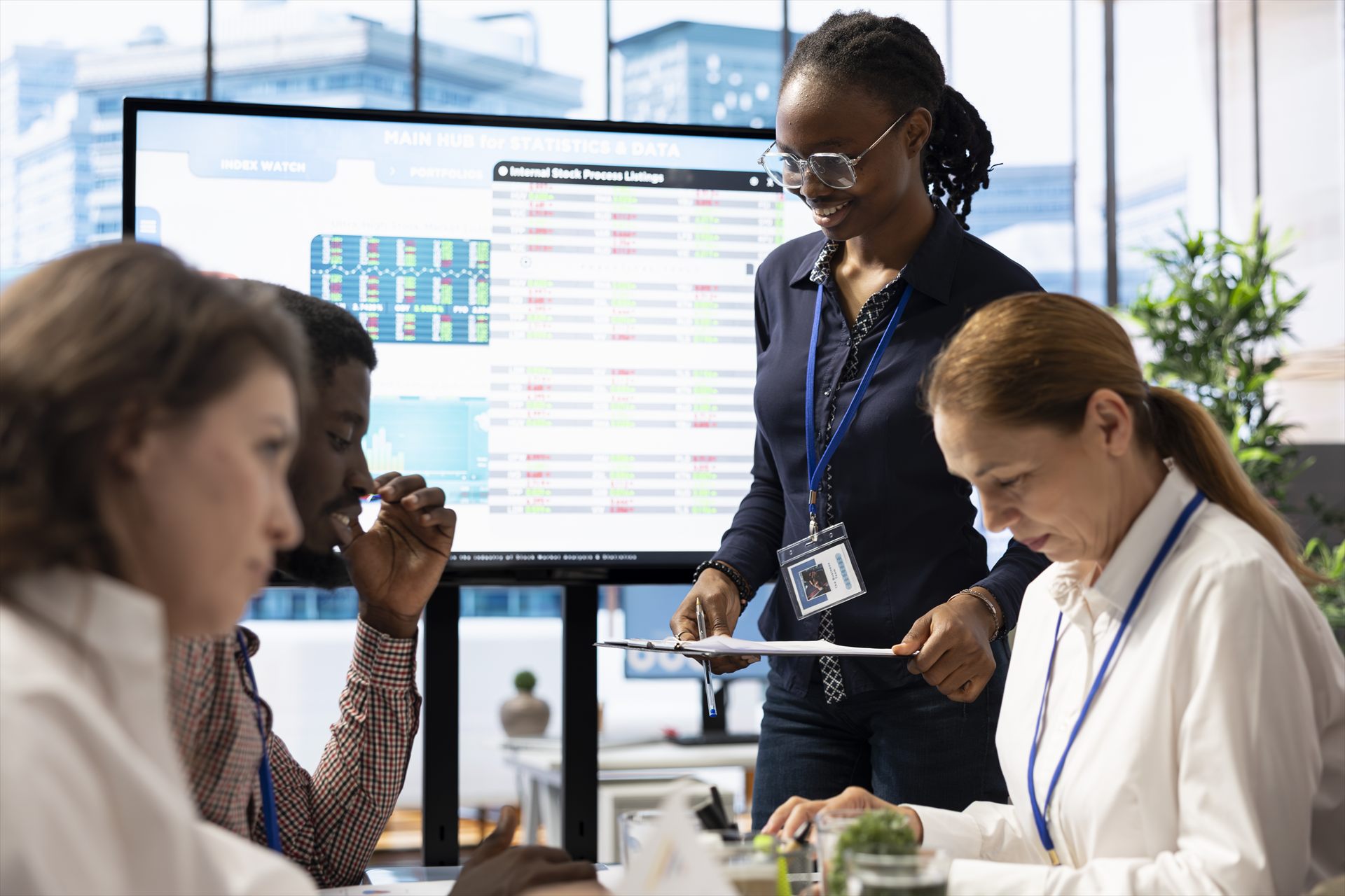 African professionals collaborating around data and technology